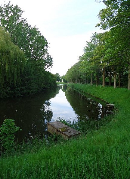 The canal with cemetery in distance