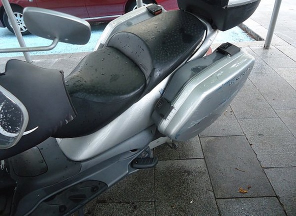 A scooter with hard panniers