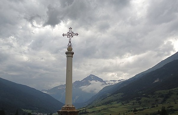 A different cross and mountains
